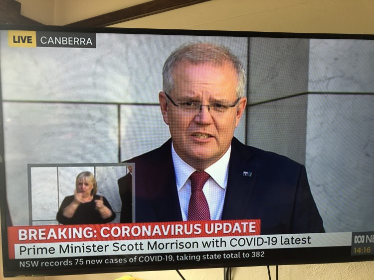 The Prime Minister talks to journalists after a national cabinet meeting on 20 March. Image from ABC broadcast