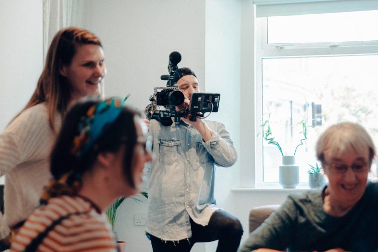 "A co-viral group might even be formed around membership of a work group, like a film production crew." Photo by Vanilla Bear Films on Unsplash.