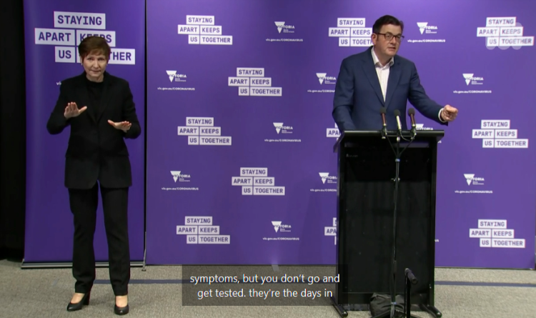 Screenshot from a media conference held by Victorian Premier Daniel Andrews, incorporating an Auslan interpreter and closed captioning