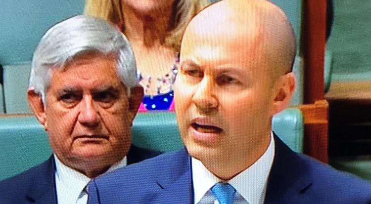 Treasurer Josh Frydenberg, flanked by Minister for Indigenous Australians Ken Wyatt