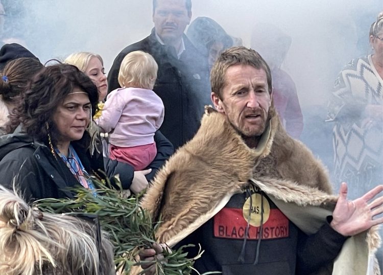 Jason Smith talks about the importance of cultural burning for healing country and future generations, at a NAIDOC Week event in southern lutruwita, Tasmania, 5 July. Photo by Melissa Sweet