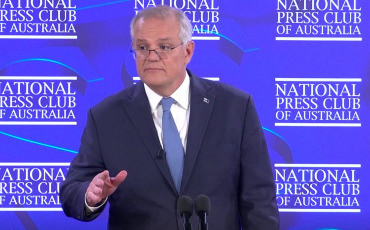 At the National Press Club, the Prime Minister announced bonus payments for "aged care workers including those providing direct care, food or cleaning services". Image from ABC broadcast.