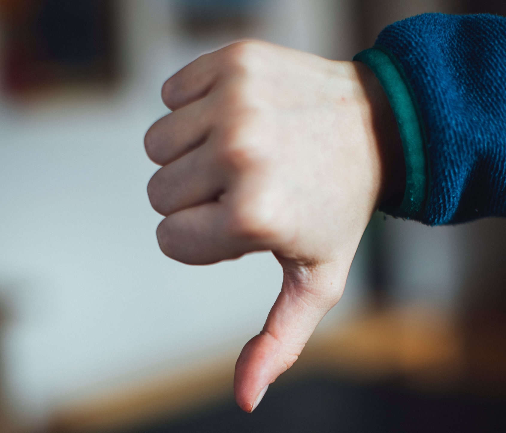 Thumbs down on advertising code. Photo by Markus Spiske on Pexels.com